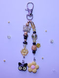 Black and Yellow Flower Bag Charm